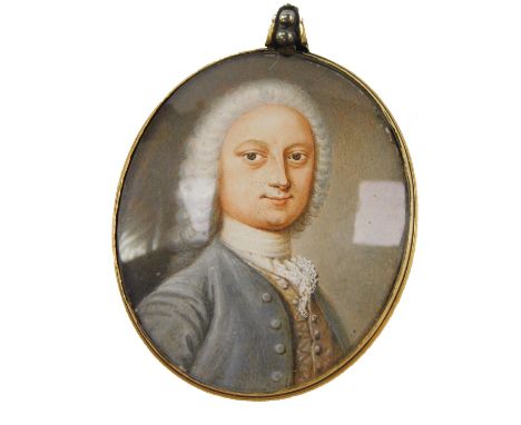 18thC School. A bust portrait miniature of a gentleman, in a yellow and white metal pendant mount, oval, 40mm x 35mm, 23.1g a