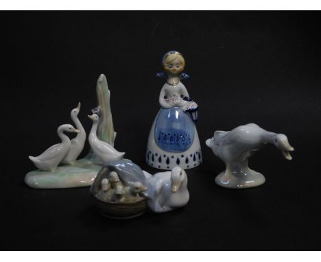 A Lladro porcelain figure group modelled as a duck and ducklings, in a basket, no 4895, impressed and printed marks, Lladro f