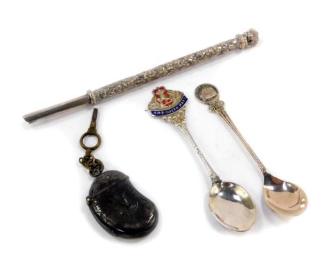 A Victorian silver vesta case, of pod form, with engraved foliate decoration, Birmingham 1900, together with a watch key, an 