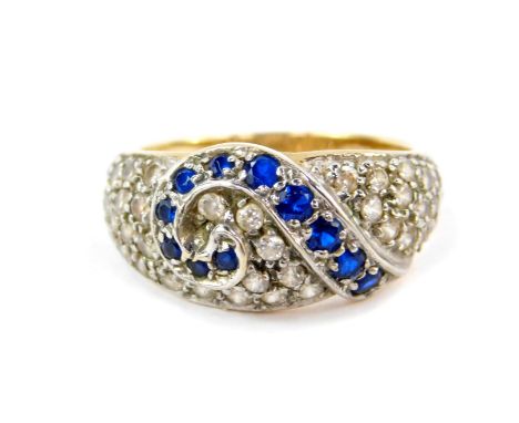 A 9ct gold sapphire and cubic zirconia ring, in a scrolling pave setting, size Q, 5.5g. 