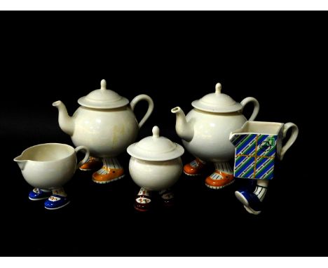 Two Carltonware lustre pottery 'Walking' teapots, sugar basin and cover, 'Happy Birthday' milk jug, and another jug. (5)
