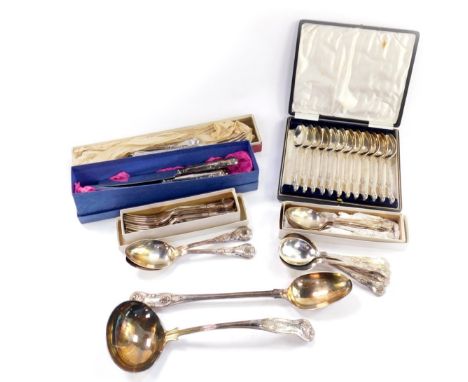 Silver plated flatware decorated in the King's pattern, including a soup ladle and basting spoon, some boxed. (qty)