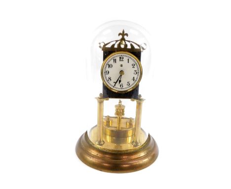 An early 20thC German brass 400 day anniversary clock, circular white enamel dial bearing initial B and crescent moon, Arabic