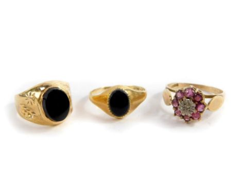 Two 9ct gold and black onyx rings, sizes L/M and I, 3.7g, together with a dress ring. (3)