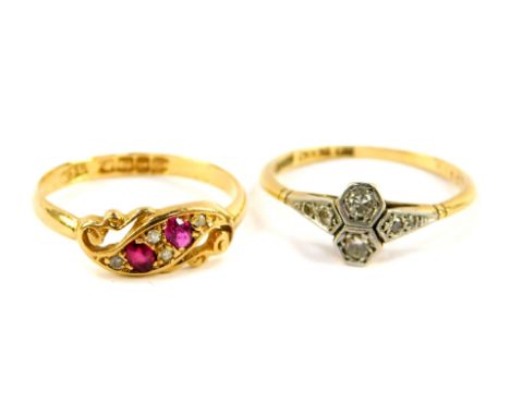 A Victorian 18ct gold ruby and diamond ring, in a swirl setting, size O, together with an 18ct gold platinum and diamond two 