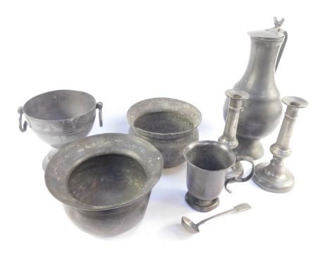 A Georgian pewter spittoon, further spittoon, pair of candlesticks, pedestal vase with ring handles, tankard, cream ladle, an