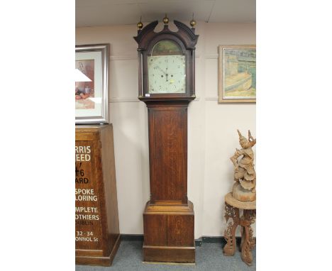 A nineteenth century oak longcase clock with painted dial by J A Thompson of Darlington, height 230 cm.