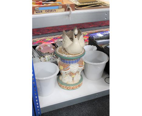 A china elephant plant stand together with a swan planter and two further pots 