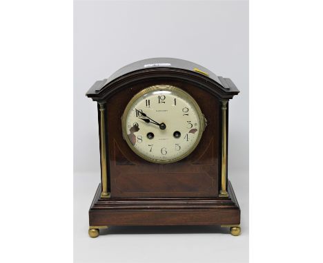 An Edwardian inlaid mahogany mantle clock by R Stewart of Glasgow, height 25 cm.