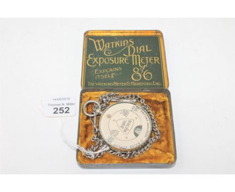 A vintage Watkins Dial Exposure Meter, in original fitted tin.