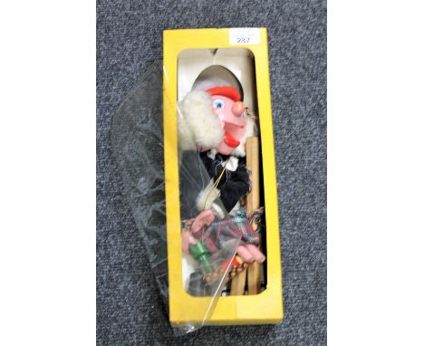 A boxed Pelham puppet -Mac Boozle 