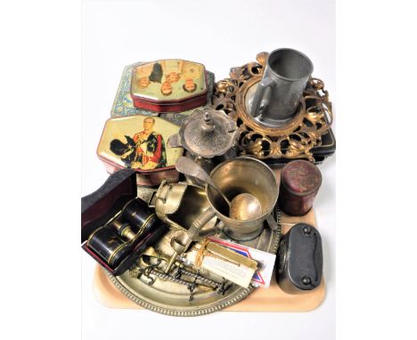 A tray containing vintage commemorative tins, set of cased brass and tortoiseshell opera glasses, money boxes plated wares et