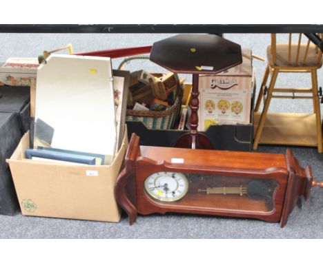 A mahogany pedestal wine table together with a highlands eight day wall clock, assorted pictures, frameless mirror
