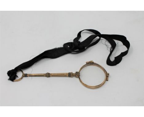 A Victorian gold plated lorgnette