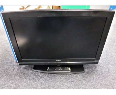 A Humax 32" LCD TV with lead, remote and manual