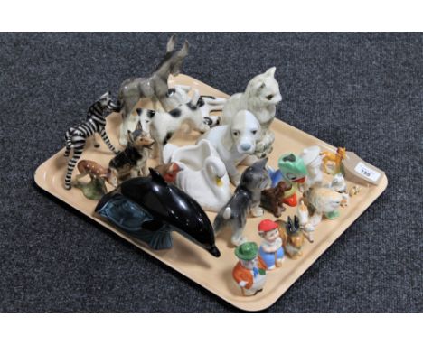 A tray of china animal ornaments, German Zebra, Poole dolphin etc 