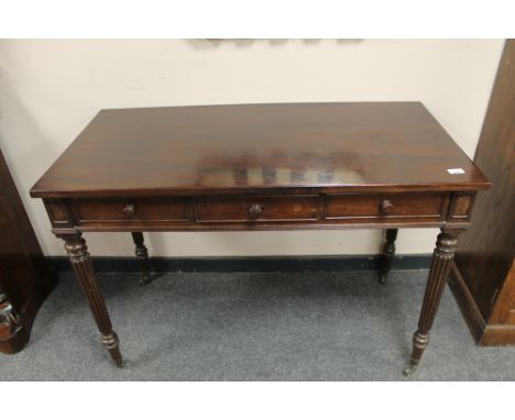 An early Victorian rosewood side table, width 110 cm. CONDITION REPORT: Light scratches to top. With dummy drawers to front. 