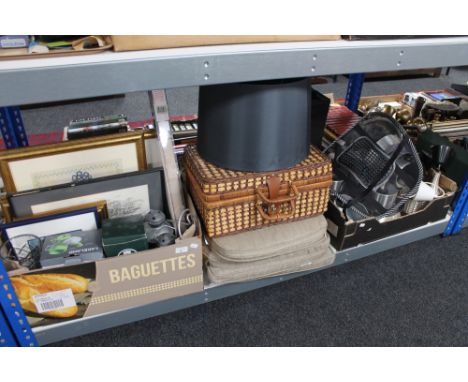 Two boxes containing assorted framed pictures, lead crystal ware, lanterns, light fittings, back rest, together with a wicker