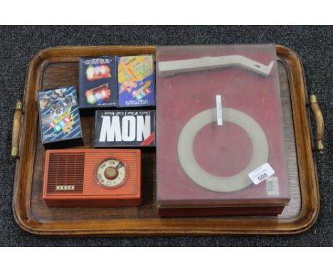 A mid twentieth century Stella battery operated record player, together with an echo transistor radio and four early NOW cass