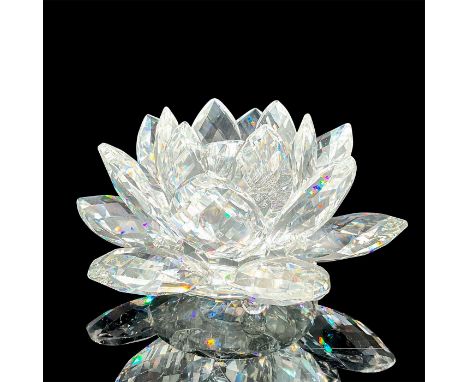 Large lead clear crystal candleholder in the shape of a multi-petal waterlily with crystal ball feet. Largest of 3 sizes of w