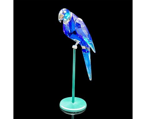 Part of the Tropical Birds and Parrots theme group. Elegant blue crystal bird with sterling silver accents on beak and legs, 