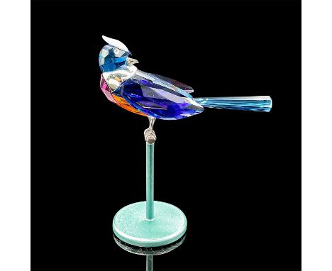 Part of the Tropical Birds and Parrots series. Lead crystal bird in beautiful shades of crystal colors with sterling silver a