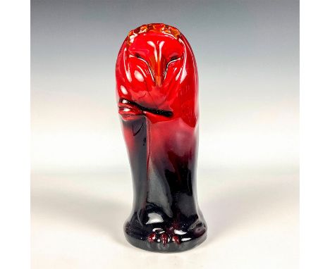 Red rich and black glaze, unrecorded version modeled as a granny owl wrapped in a cloak. Impressed 228 to base. Royal Doulton