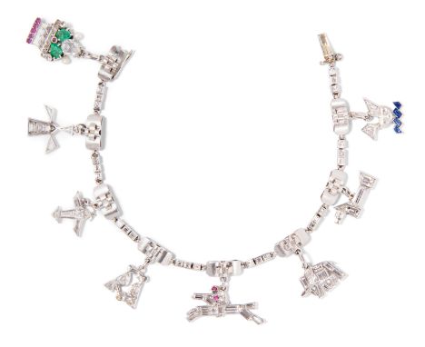 Art Déco Charms-BraceletWohl Frankreich. Platin. Seltenes Bracelet aus feinen geometrisch gestalteten Gliedern, welche mit 24