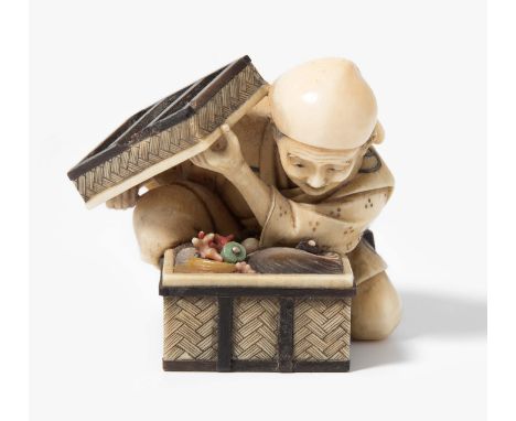 Netsuke von Yasuaki (Homei) Japan, Meiji-Zeit. Signiert Yasuaki mit rotem Siegel Kodama. Elfenbein, eingelegt mit Silber, Kor