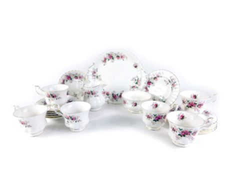 A Royal Albert Lavender Rose pattern part tea service, comprising milk jug, sugar bowl, cake plate, six cups and saucers, and