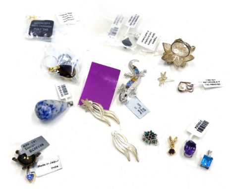 A silver ring and earring set, a smoky quartz Swarovski crystal pendant, a pair of silver gilt cultured pearl screw in earrin