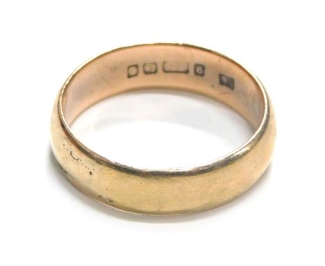 A 9ct gold wedding band, of plain design, ring size X, 7.2g.