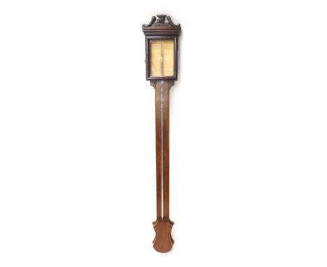 A 20thC mahogany stick barometer, with paper dial, visible tube and shield shaped cistern cover, 100cm high. 