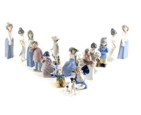 A collection of Nao figurines, to include young boy with football, a child wearing suit of cards, figurines, etc. and a Jack 