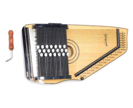 An Ozark auto harp, boxed.