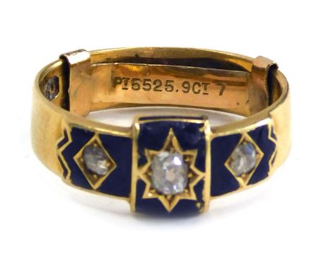 An 18ct gold Victorian memorial ring, set with three old cut diamonds, black enamel outer border, the central stone approx 0.