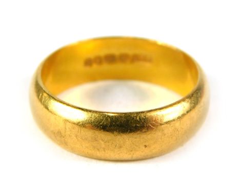 A 22ct gold wedding band, of plain design, ring size N½, 6.9g. 