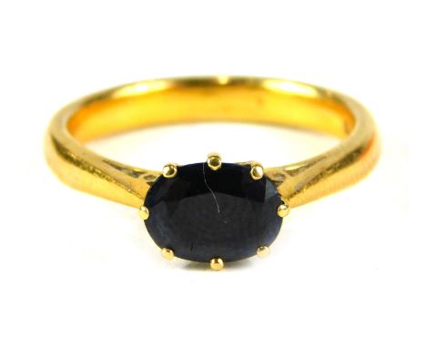 A 22ct gold sapphire dress ring, with oval sapphire in eight single claw setting, ring size O½, 5.3g all in. 