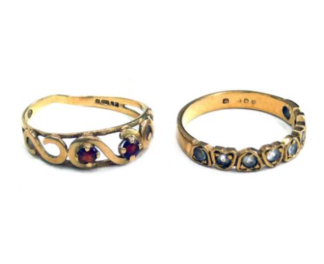 Two dress rings, comprising a half hoop eternity ring, set with ting diamonds, one missing, yellow metal stamped 15ct, and a 