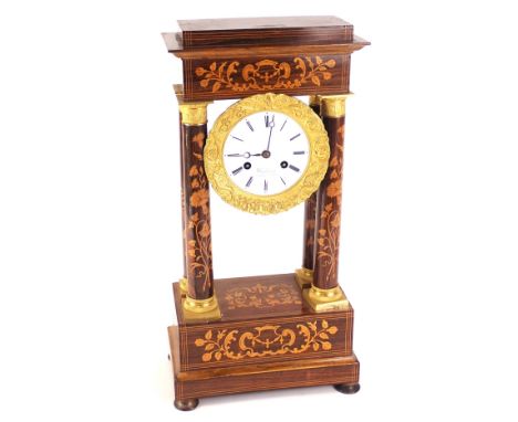 A 19thC French rosewood marquetry portico type mantel clock, decorated overall with scrolls, flowers etc., the enamel dial si