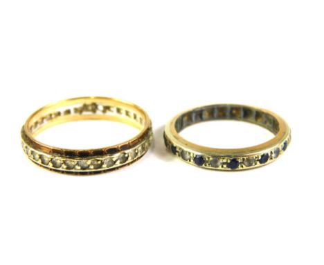 Two 9ct gold eternity rings, one set with sapphire and cz, ring size J½, and another set with imitation diamonds, ring size O