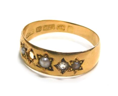 A 15ct gold Victorian gypsy ring, set with tiny diamonds and cultured pearls, one stone missing, ring size M½, 2g all in.