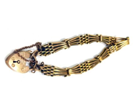 A 9ct gold gate bracelet, of four bar fan design, with heart shaped padlock and safety chain, 18cm long, 11.5g all in. 