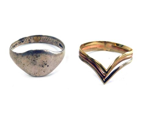 A 9ct gold and silver gents signet ring, and a three bar wishbone ring of tricolour form, yellow metal stamped 9ct, 4.3g all 