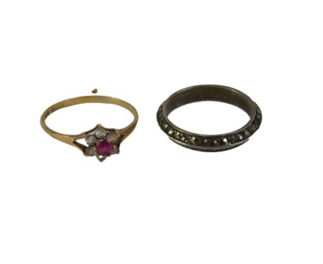 A ladies floral set dress ring, marked 375 on plain shank, size R, 1.2g, and a further dress ring.&nbsp; &nbsp;(2)&nbsp; Auct