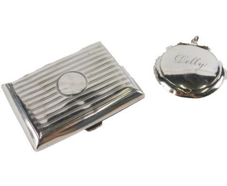 Two silver wares, comprising a George V silver cigarette case, with engine turned stripped decoration, Birmingham 1912, and a