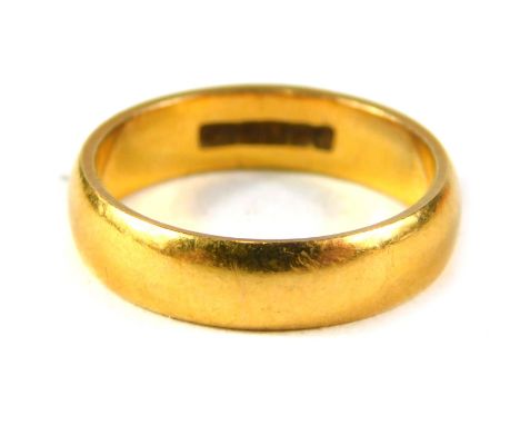 A 22ct gold wedding band, of plain design, ring size K, 4.8g. 