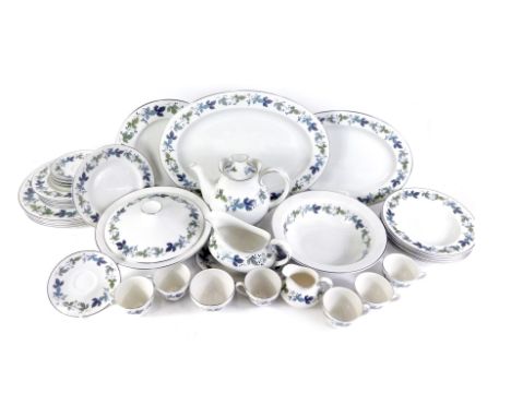 A Royal Doulton Burgundy pattern part tea and dinner service, comprising cups and saucers, tea pot, milk jug, sugar bowl, two