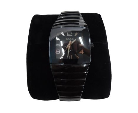 A Rado gentleman's wristwatch in ceramic, having rectangular dial with applied coffin markers and Arabic numerals with date a