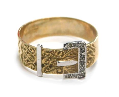 A 9ct gold buckle ring, white and yellow gold, with scroll detail and tiny diamond set, ring size X½, 4.4g all in.